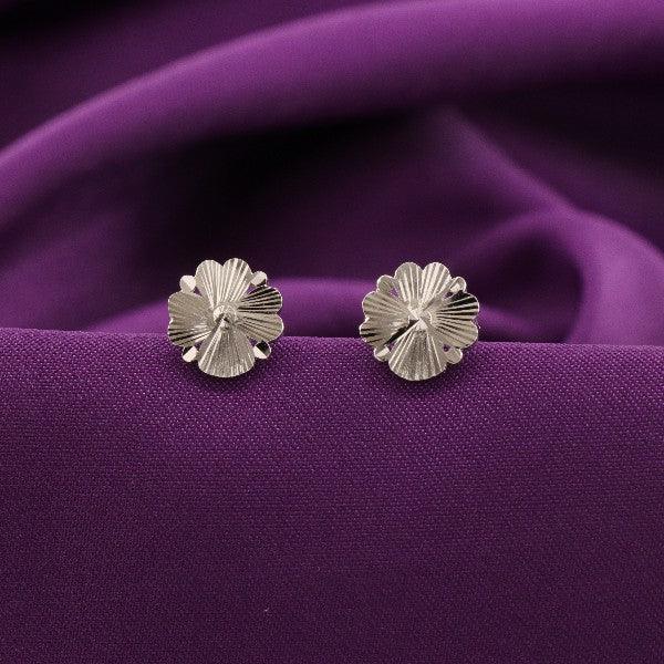 925 silver Hiya women studs STD-259 with floral design on a purple fabric background