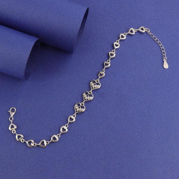 925 silver Hiya women's bracelet LBR-311 with heart-shaped links on a blue background, 21cms length, 7g weight, and 925 purity.