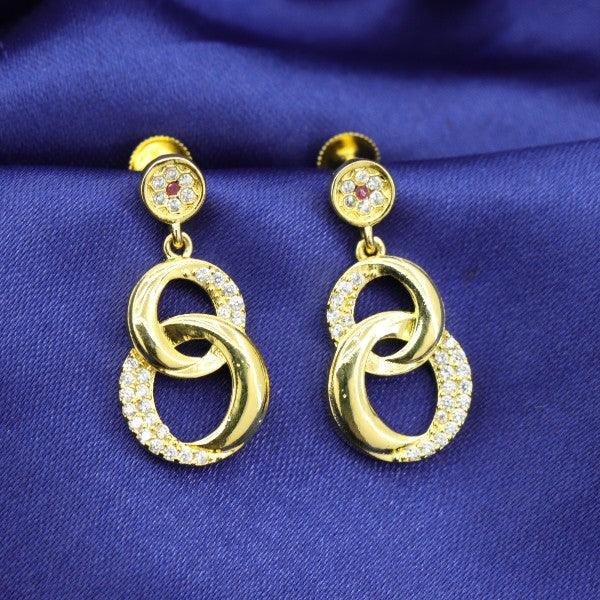 Elegant 925 silver Ahalya women danglers DAN-100 with gold and diamond accents on a blue fabric background.