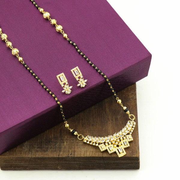 Elegant 925 silver Anushri women's necklace NK-103 displayed with matching earrings on a purple gift box.