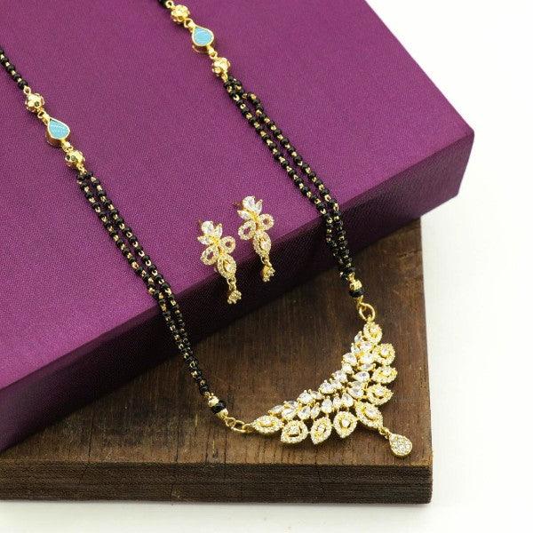 Elegant 925 silver Chanasya women's necklace NK-99 with a floral design and matching earrings on a purple jewelry box.