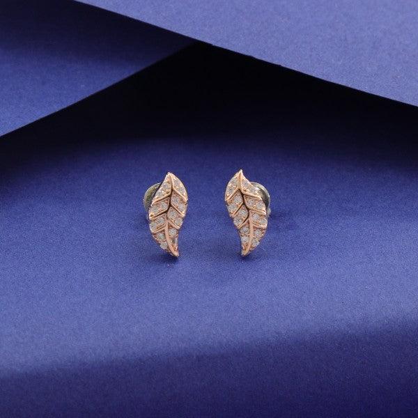 925 silver leaf kids studs KS-114 against blue background, 2g lightweight earrings with intricate leaf design and 925 purity.