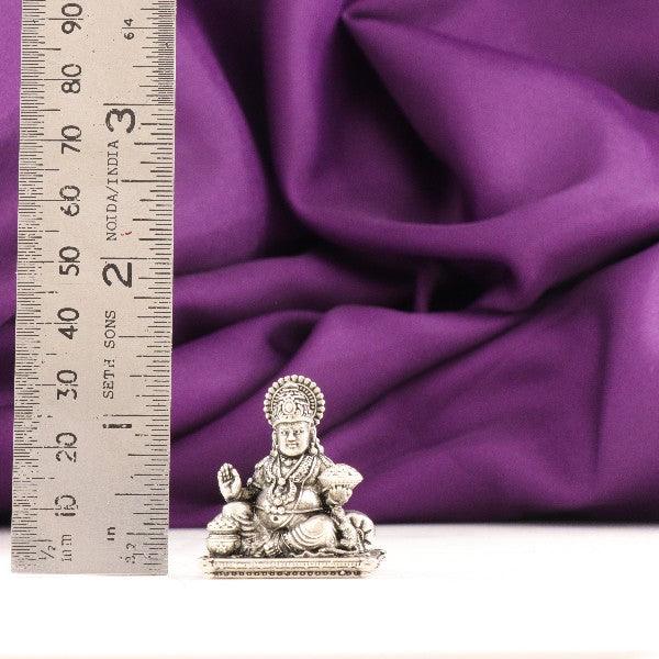 925 Silver 3D Kuber Idol weighing 36g and measuring 3cm in length, with a ruler for scale, placed against purple fabric