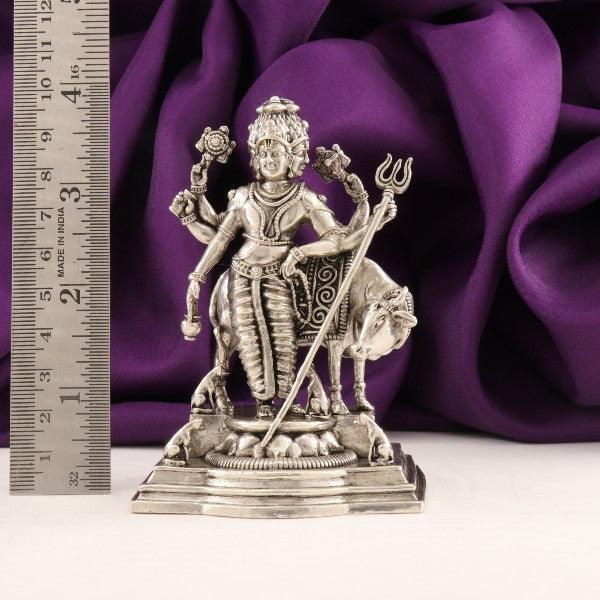 925 silver 3D Dattatreya idol weighing 185g and measuring 9.5cms in length, displayed next to a ruler with a purple fabric background