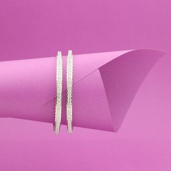 925 Silver Yaalini Women Bangles WB-29 displayed on a pink background, showcasing elegant design and high-quality purity 925 silver craftsmanship.