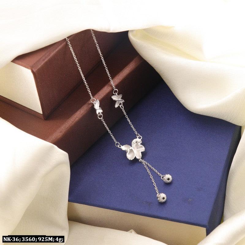 Elegant 925 Silver Jaladhija Women Necklace NK-36, 4g with floral design displayed on silk and classic book background.