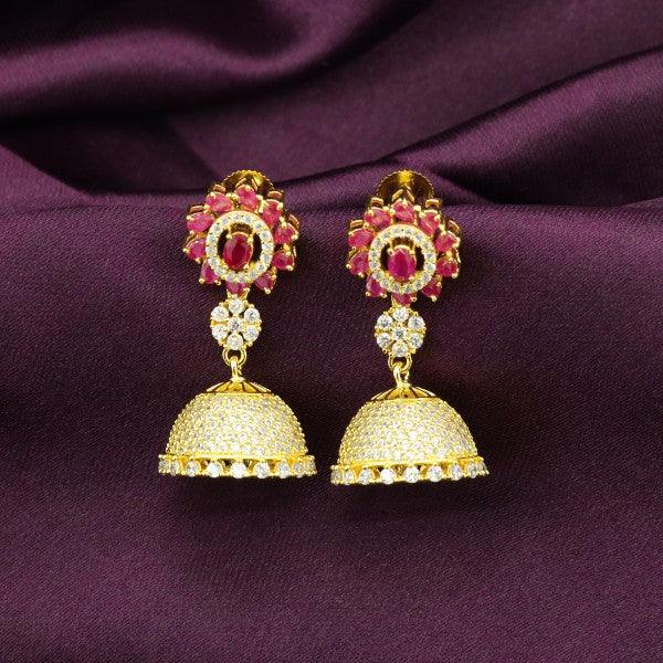 925 silver Shakuntala women jhumkas JHK-137 with intricate gold finishing and ruby embellishments on a purple fabric background