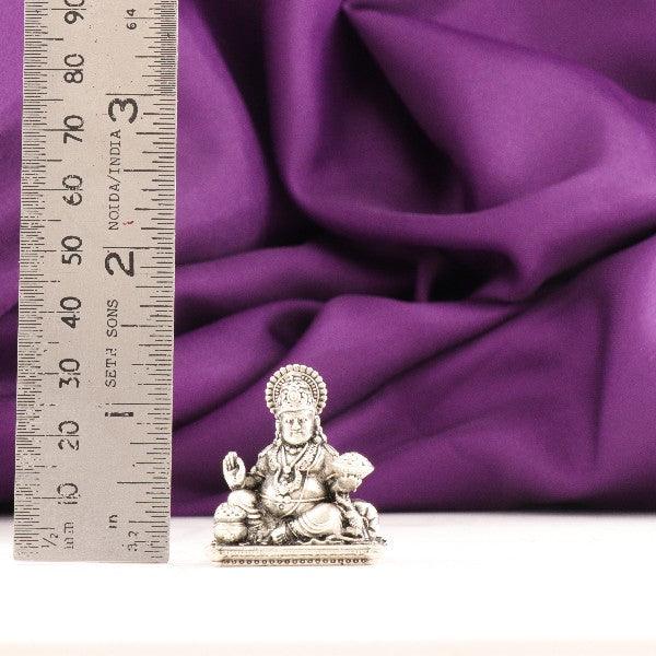 925 silver 3D Kuber idol with ruler for scale, 36g weight and 3cms in dimension, displayed against purple fabric backdrop.