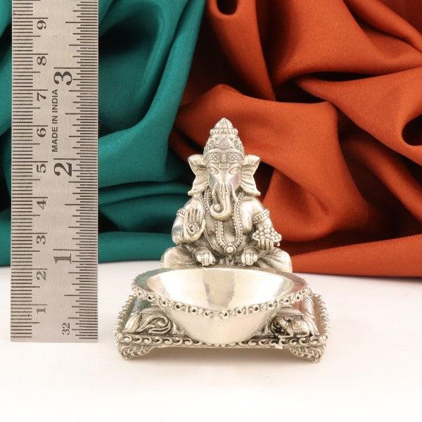 925 silver 3D Ganesha Deepam article with intricate design, weight 88g, purity 925, placed next to a measuring scale for dimension reference.