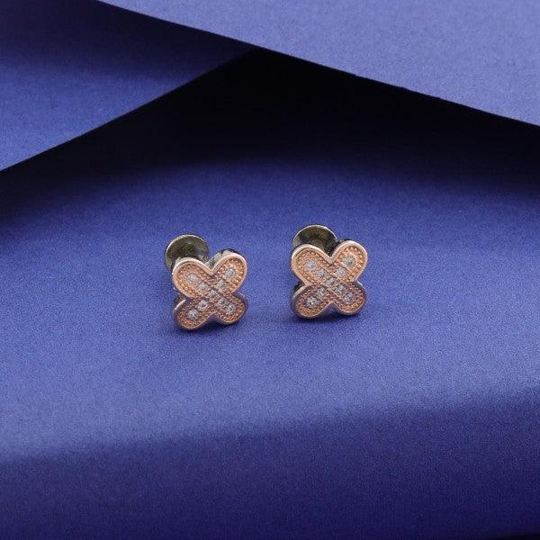 925 silver flower-shaped kids studs KS-111 on a blue background, showcasing elegant craftsmanship and 2g weight.