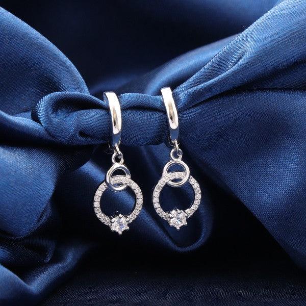 925 silver circle women hoops HOO-3 earrings with crystal accents, displayed on a navy blue fabric background. Weight 3g, purity 925