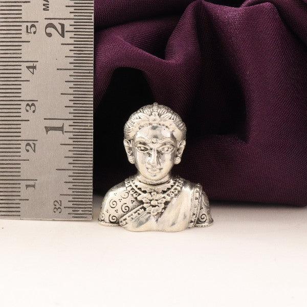 925 silver 3D Gouri face idol, 57g, 3cm, with ruler for size reference against purple cloth background