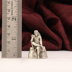 925 silver 3D Sai Baba idol, 32g weight, 3.5cm height, placed next to a ruler for scale.