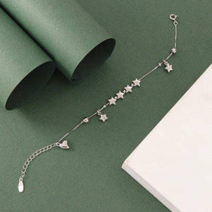 925 Silver Star Women Bracelet LBR-293, 21.5cms in length, featuring star charms on a green background.