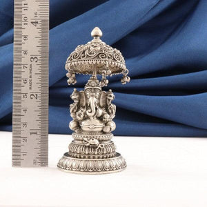 925 silver 3D Ganesha idol, 10cm, 103g, purity 925, with intricate details and a decorative canopy, next to a measuring ruler.