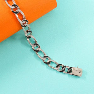 925 silver Pramit men bracelet MB-186 weighing 27g and 21.5cms in length on a colorful background