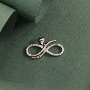 925 silver infinity women pendant WP-64 on green background, elegant silver jewelry with infinity symbol, weight 2g, perfect for gift or special occasion