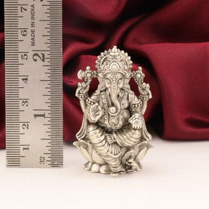 925 silver 3D Ganesha idol weighing 63g and 5.5cms in height with a ruler for scale in the background.