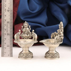 925 silver Gajalakshmi deepam articles weighing 174g showcasing intricate designs and high-purity craftsmanship.