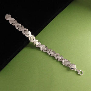 925 silver Nagendra men's bracelet MB-114 with a 21cm length and 33g weight on a green background.