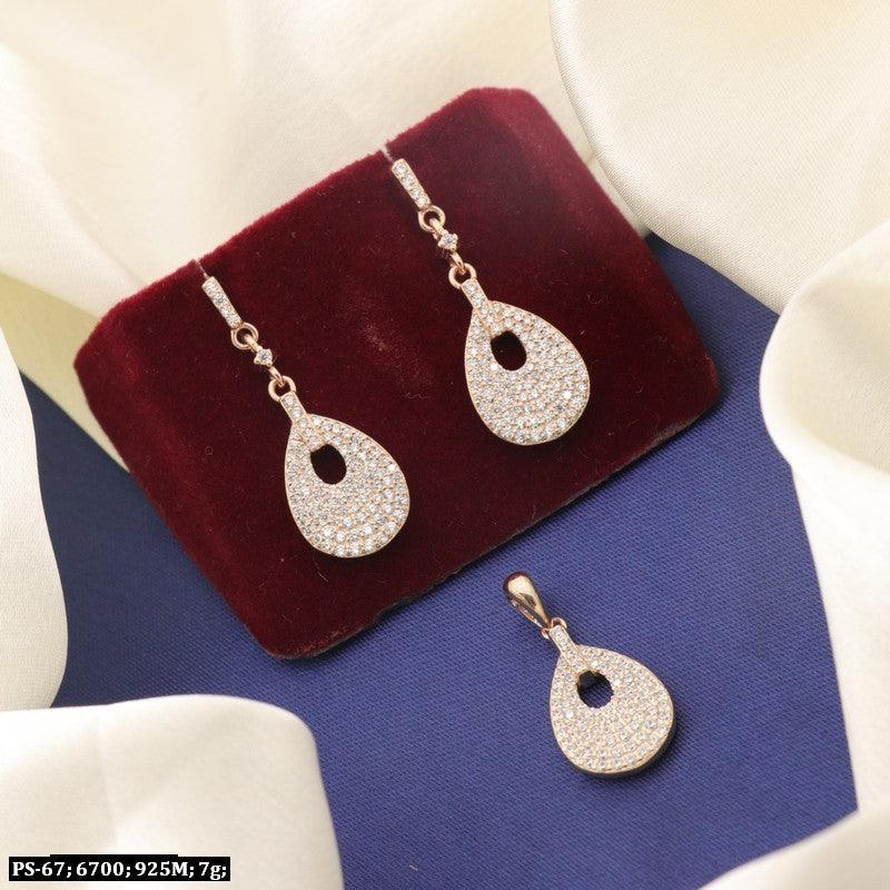 925 silver Ekta women pendant set in red and blue cushion, featuring drop design with sparkling details, set includes earrings and pendant.