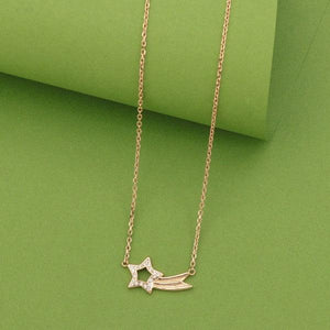 925 silver star women's necklace NK-151, 4g, hanging on a green background
