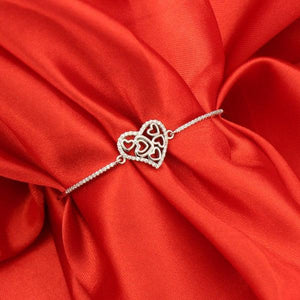 925 Silver Heart Women Kada WKD-148 displayed on a vibrant red fabric.