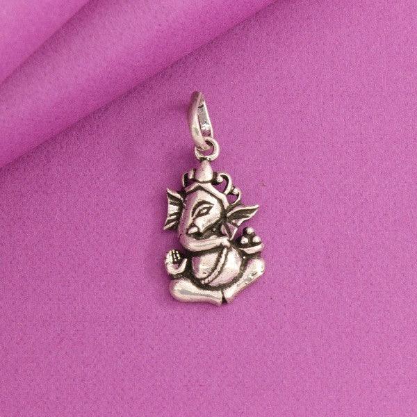 925 Silver Ganesha God Pendant GP-132 with 3g weight and 925 purity on a pink background