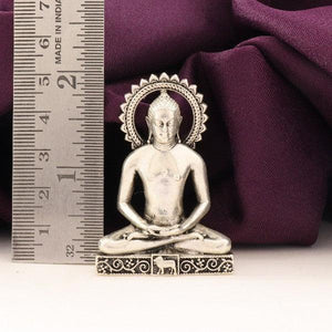 925 Silver 3D Mahaveer Idol weighing 64g and 5cms in length, placed beside a ruler for scale, showcasing intricate details and craftsmanship.