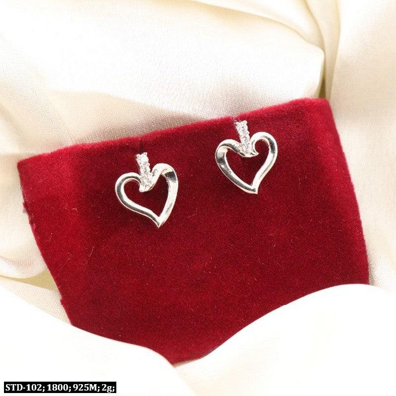 925 silver heart-shaped Mayurika women studs STD-102 placed on red velvet with 2g weight