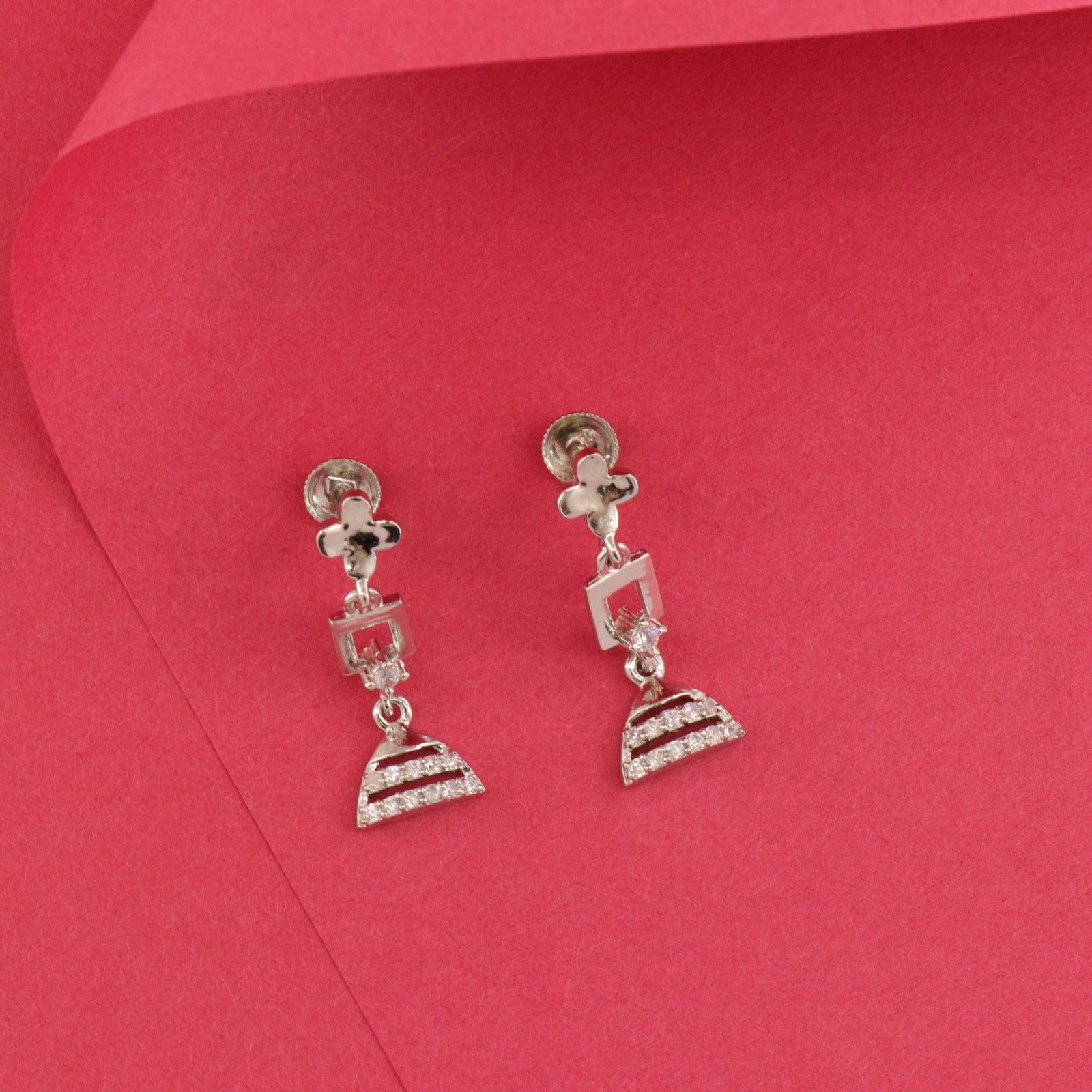 925 Silver Sonal Women Danglers DAN-140, 3g, Pure 925 Silver Dangling Earrings on Red Background