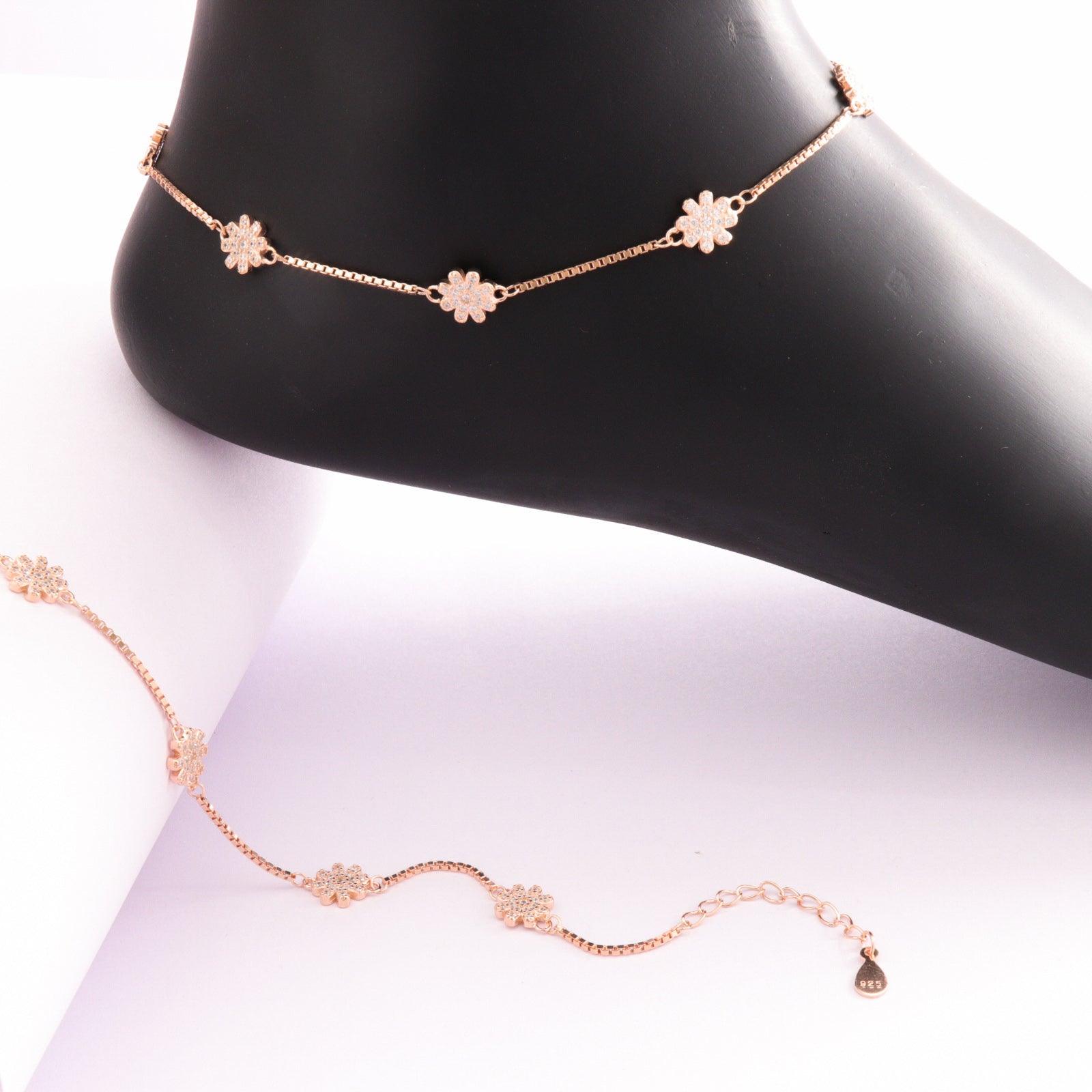 925 silver Nandita women's anklet ANK-120 with floral design, 27.5cm long, 8g weight, displayed on black mannequin leg